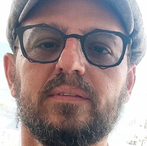 Денис Каплан